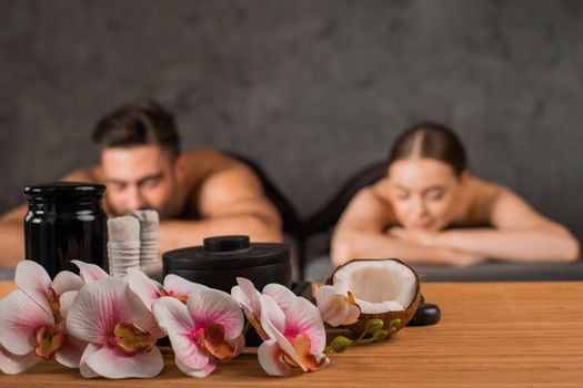 Attractive couple relax at the spa salon. Beauty treatment concept.