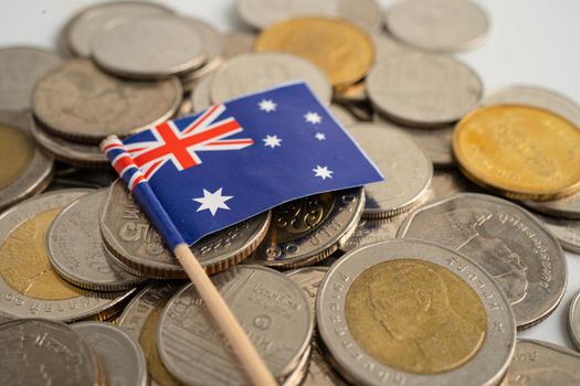 Stack of coins with Australia flag on white background. flag on white background.