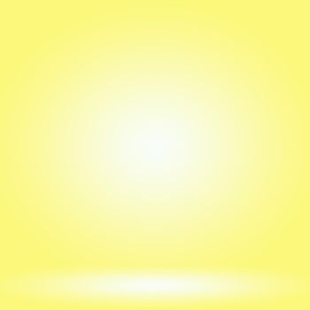 Abstract solid of shining yellow gradient studio wall room background