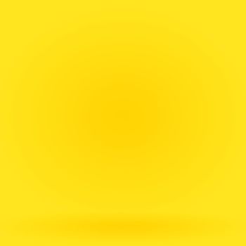 Abstract solid of shining yellow gradient studio wall room background