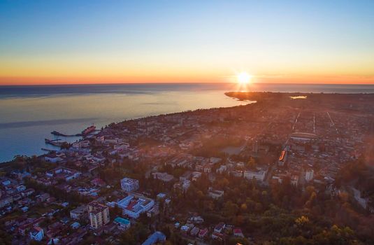 Sukhumi, Abkhazia-September 26, 2017: Top view of the evening city by the sea.