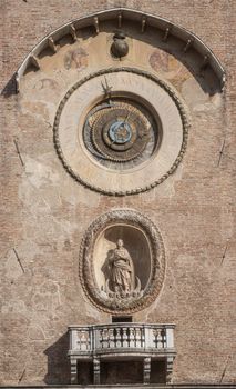 Mantua, Italy. July 13, 2021.  Detail of the clock tower in Piazza delle Erbe in the city center