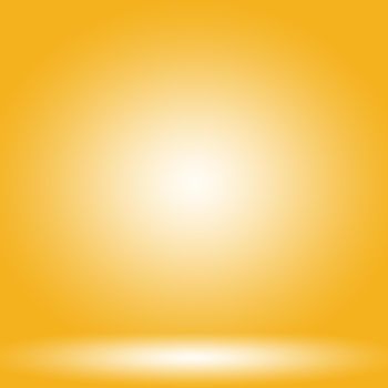 Abstract solid of shining yellow gradient studio wall room background