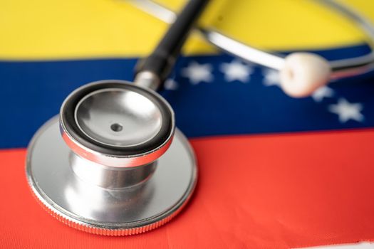 Black stethoscope on Venezuela flag background, Business and finance concept.