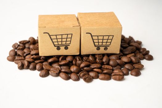 Box with shopping cart logo symbol on coffee beans, Import Export Shopping online or eCommerce delivery service store product shipping, trade, supplier concept.