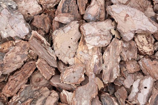 Background made of wood chips, closeup shot, wooden texture.