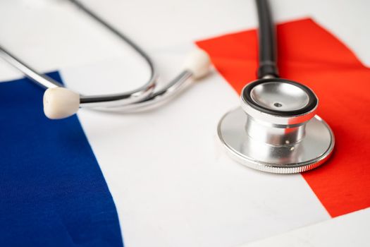 Black stethoscope on France flag background, Business and finance concept.