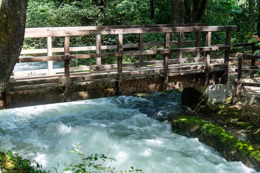 bridge that crosses the river resulting from the marmore waterfall