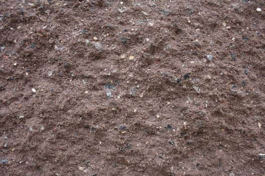Red texture, background or Wallpaper. Chopped Rough Stone Structure