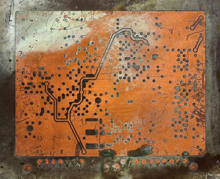 Abstract detail of the old and damaged printed circuit board - technology texture