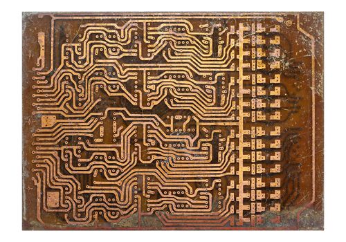 Abstract detail of the old and damaged printed circuit board - technology texture