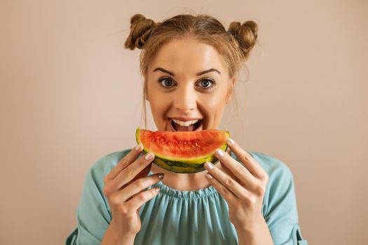 Portrait of happy cute woman enjoys eating watermelon.Toned image