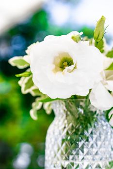 Wedding decoration, table decor and floral beauty, bouquet of white roses in luxury restaurant, beautiful flowers from summer garden.