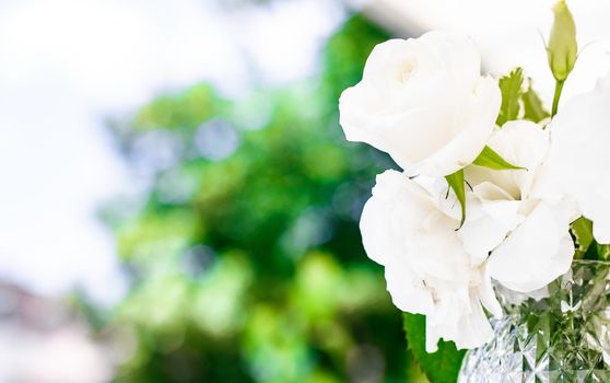 Wedding decoration, table decor and floral beauty, bouquet of white roses in luxury restaurant, beautiful flowers from summer garden.