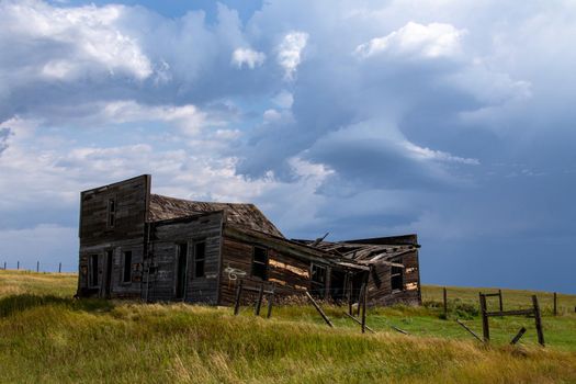 Prairie Storm Canada Summer time clouds abandoned building