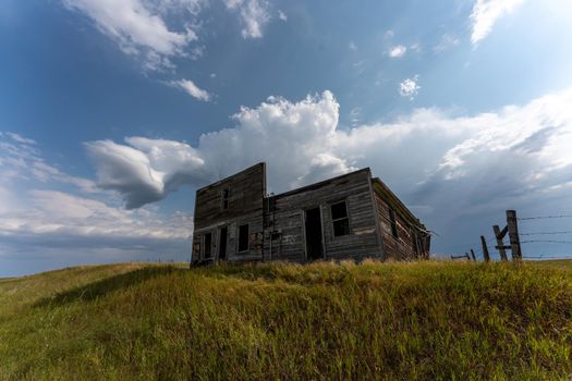 Prairie Storm Canada Summer time clouds abandoned building