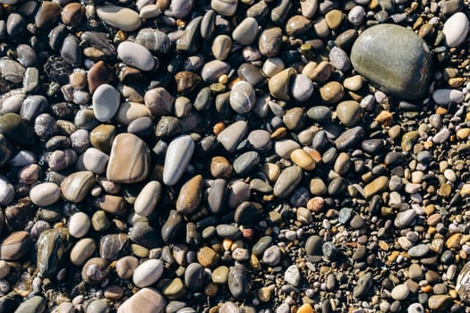 Sea stones background. Small pebbles or stone in garden. Texture background.