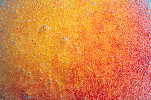 Peach under water close-up macro, selective focus. Concept fruit diet