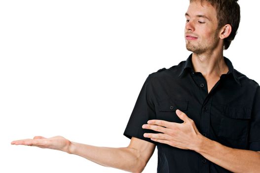 Young man holding anything you want on his hand isolated on white