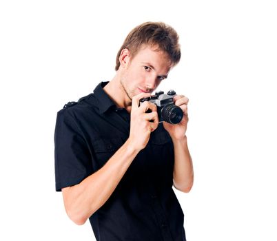 Young man isolated on white with camera