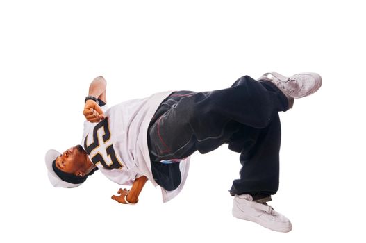 Cool young hip-hop dancer on white background