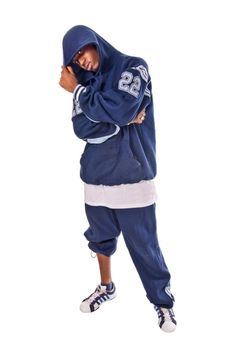 Cool young hip-hop dancer on white background