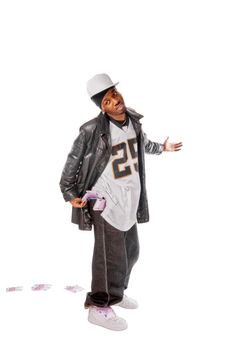 Cool young hip-hop dancer on white background