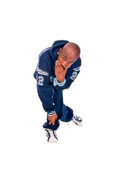 Cool young hip-hop dancer on white background
