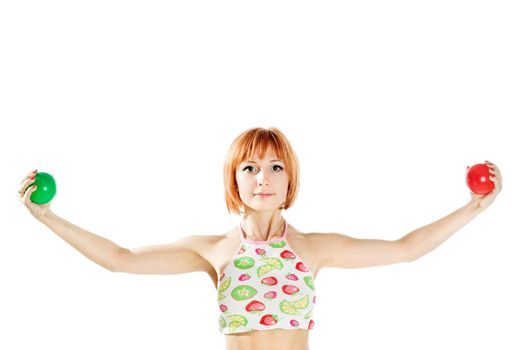 Young red-haired fitness girl isolated on white background