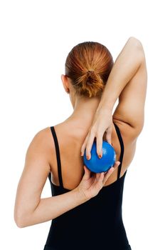 Beautiful fit red girl working out with blue ball