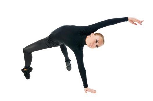 Beautiful modern dancer performing on white background