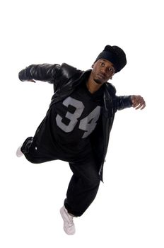 Cool young hip-hop dancer on white background