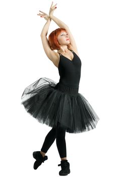 Red ballerina wearing black tutu posing on white background.