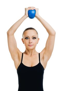Beautiful fit red girl working out with blue ball