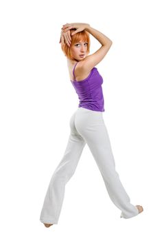 Fit girl performing active exercises on white background