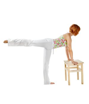 Girl performing fitness exercises isolated on white background