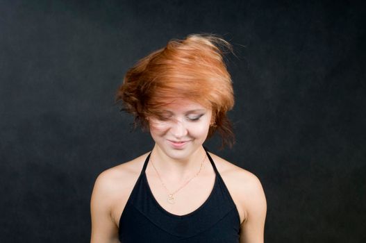 Portrait of a beautiful red haired girl.