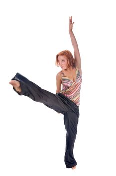 Red haired girl performing fitness exercises on white background