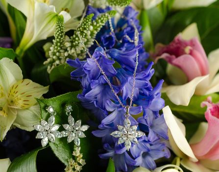 Silver necklace and earrings in flowers - bouquet