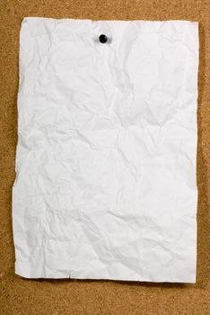 Page of old run-down paper attached to the bulletin board.