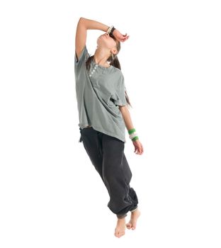 Beautiful contemporary dancer performing on white background.