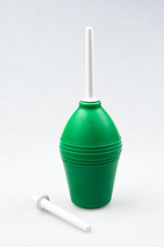 Enema (clyster) on white background with soft shadow