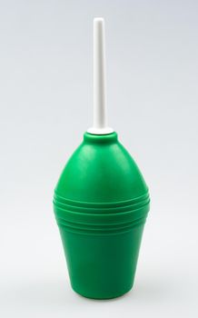 Enema (clyster) on white background with soft shadow