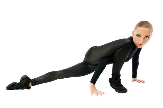 Beautiful modern dancer wearing black on white background
