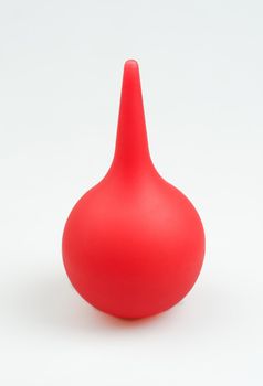 Enema (clyster) on white background with soft shadow