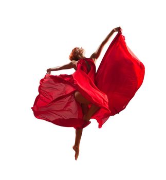 Gorgeous young flying dancer wearing red dress