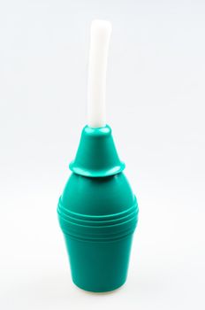 Enema (clyster) on white background with soft shadow