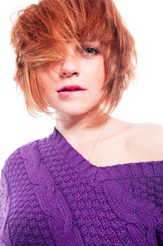 Portrait of a red haired girl isolated on white