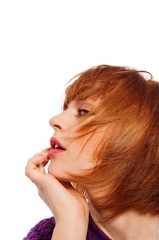 Portrait of a red haired girl isolated on white