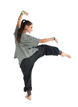 Beautiful contemporary dancer performing on white background